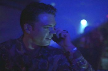 Michael, talking on the phone, just before being accosted by an alien